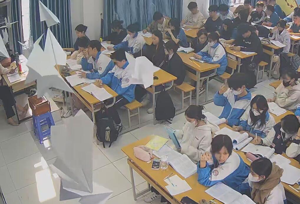 The teacher dangling shoeplay and dipping many times during class 17