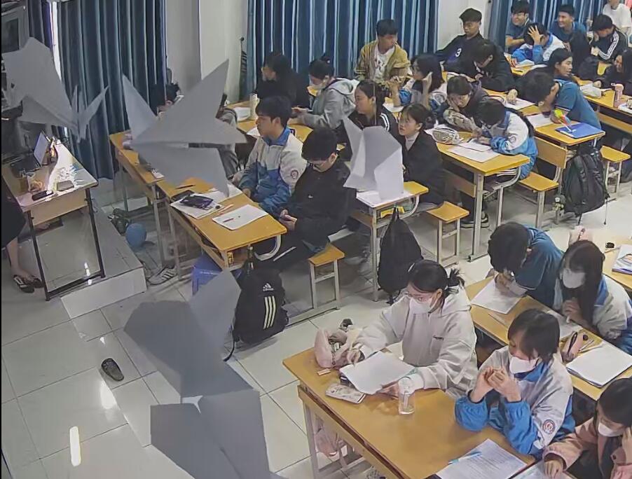 The teacher dangling shoeplay and dipping many times during class 20