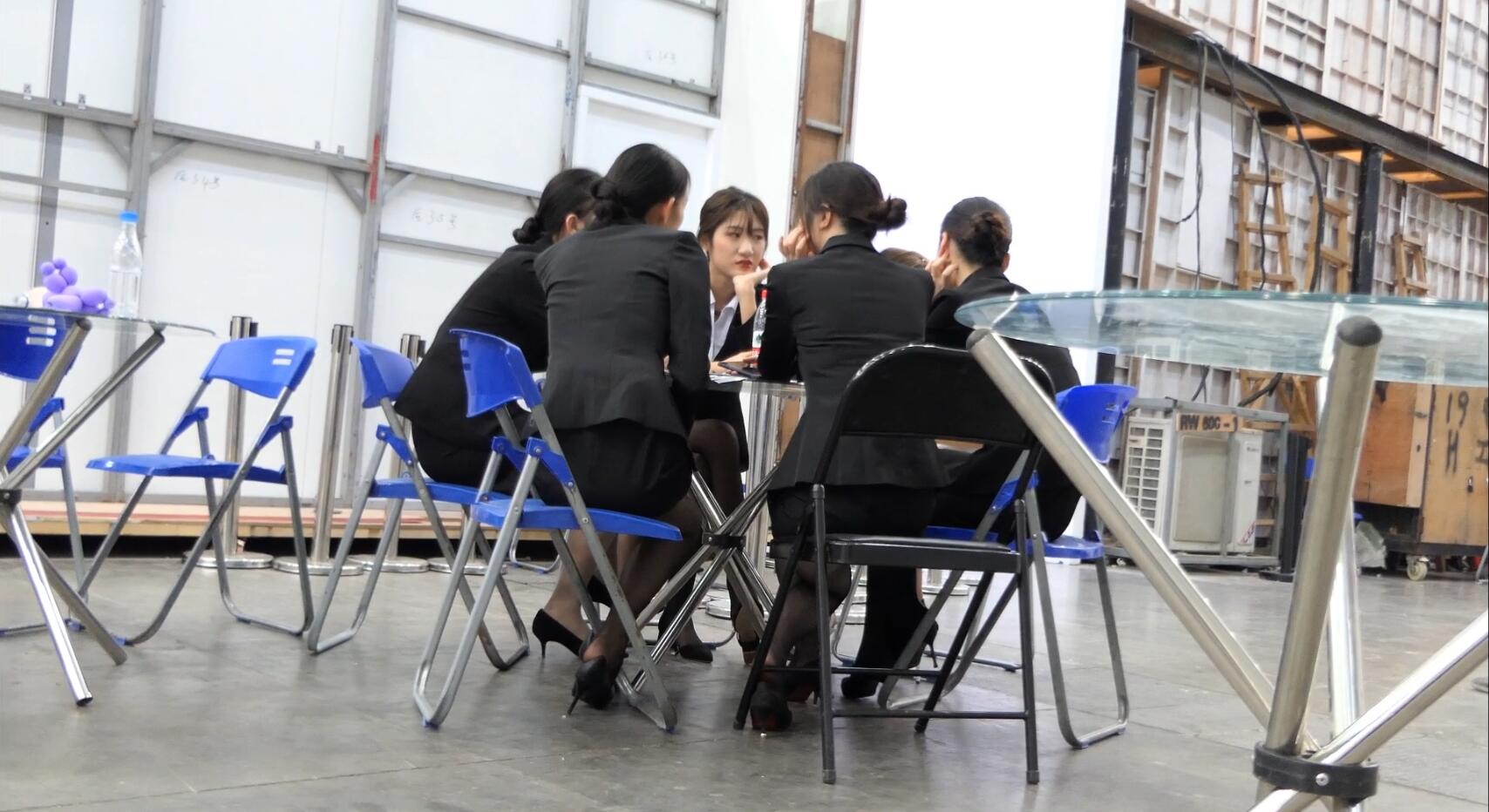 Group of black nylon feet dangling dipping and heelpopping