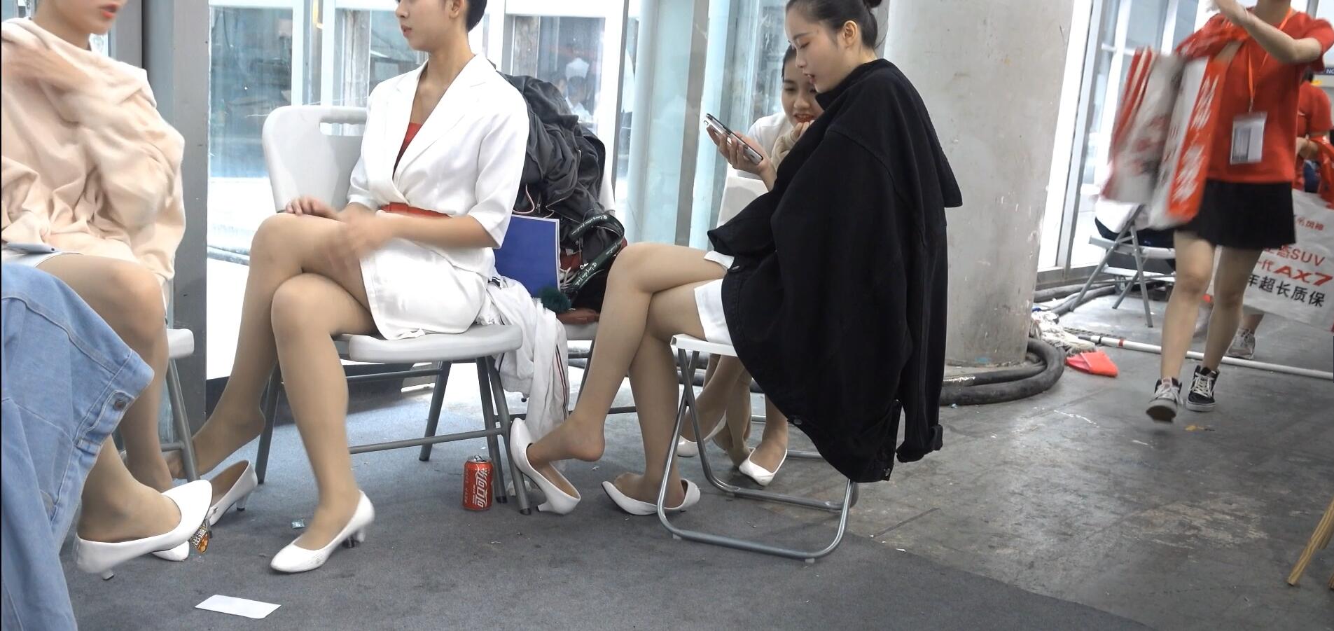 3xLong-legged models in white heels dangling and shoeplay