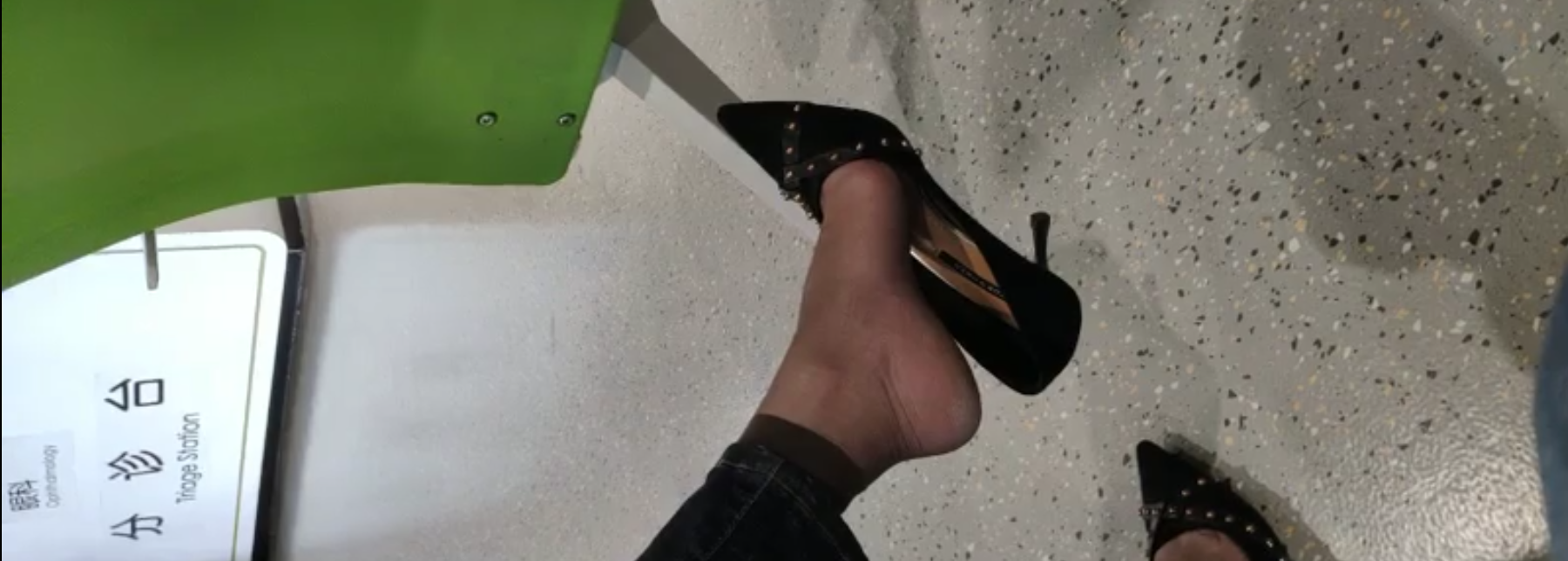 When lady in heels sit down  80% chance dangling shoeplay i think