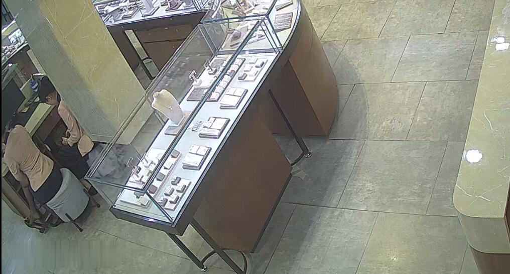 Watch the hostess who in the lower left corner of the screen