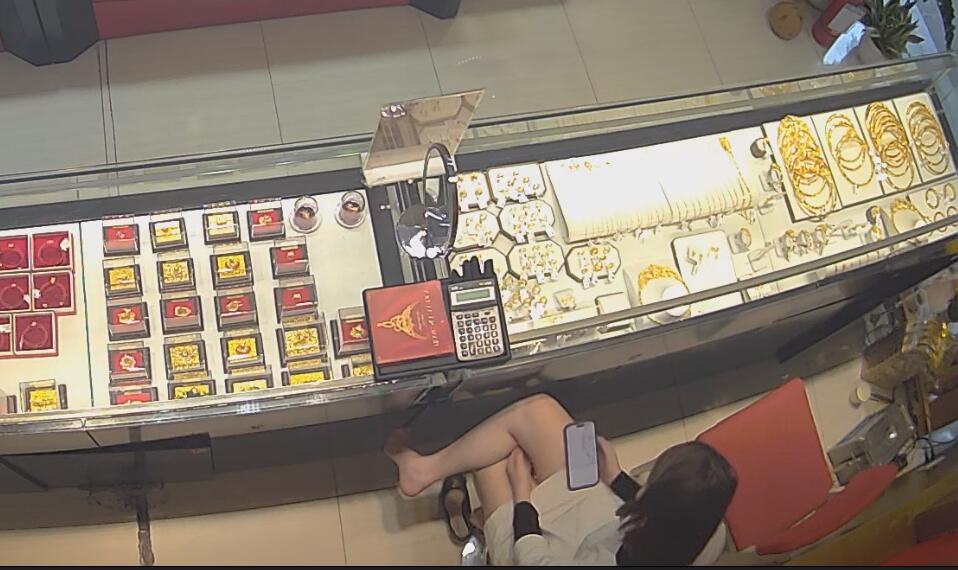 The jewelry store hostess in white dress great dangling shoeplay 6