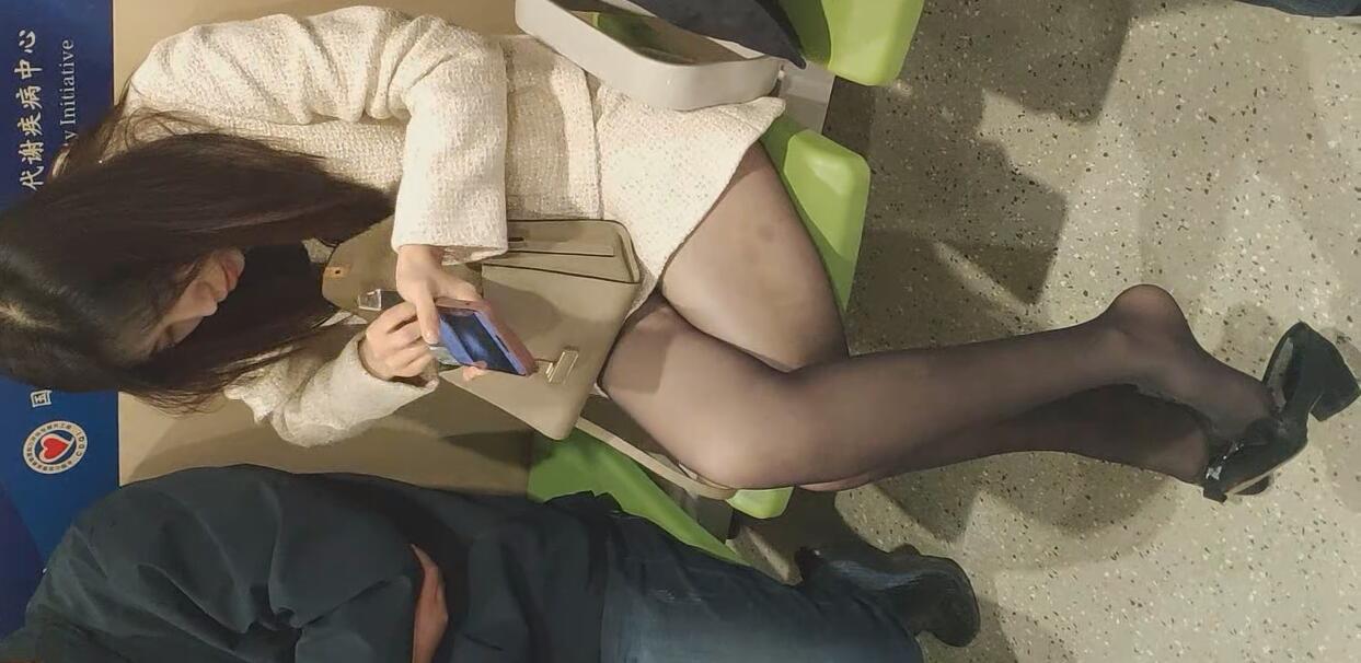 The pretty girl in black nylon great dangling shoeplay