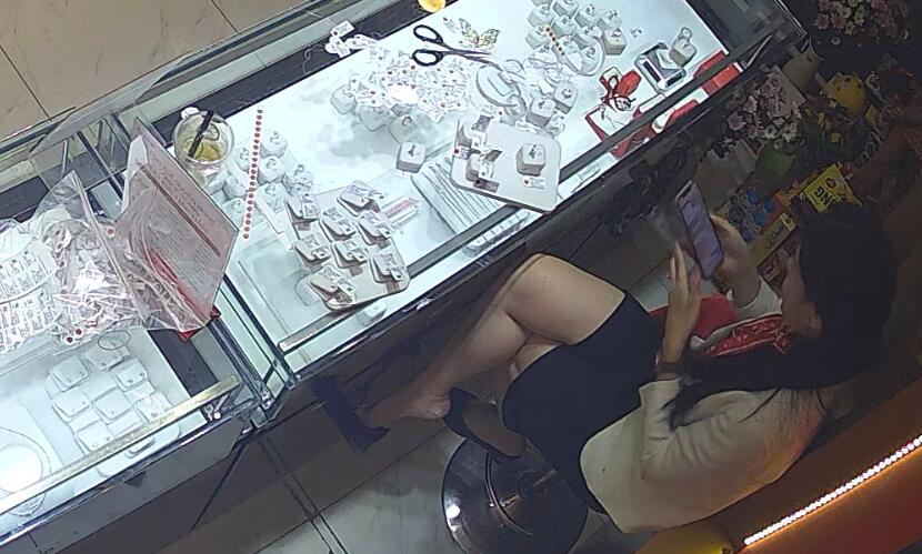 The jewelry store hostess in white dress great dangling show