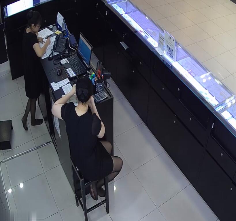 The jewelry store hostess in black nylon show us her cute feet! 245