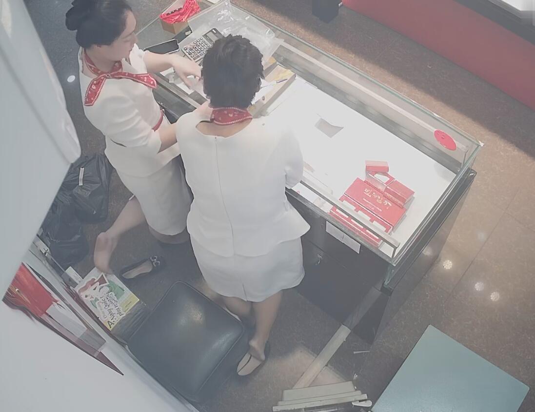 The two jewelry store hostesses dipping shoeplay at sametime